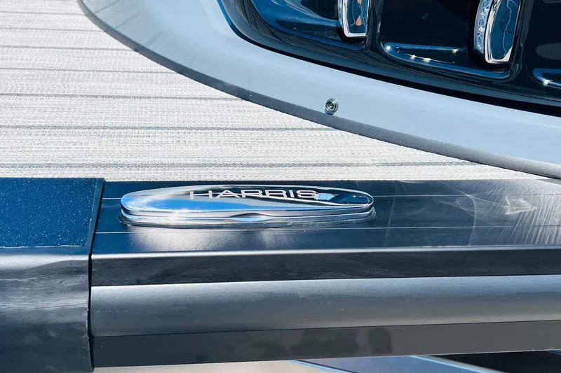 Slide: The Image of 2027 Harris Grand Mariner 250 SL boat detail with sleek chrome finish. - 41