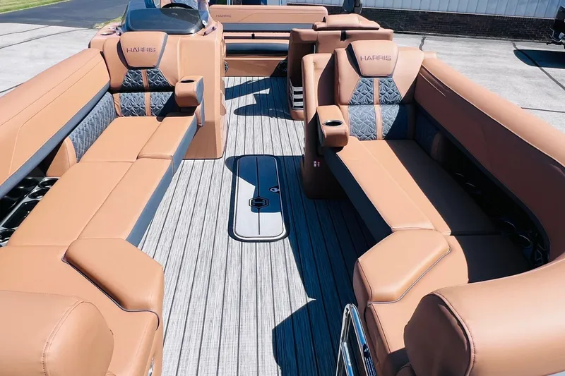 Slide: The Image of 2027 Harris Grand Mariner 250 SL pontoon boat with luxurious tan seating and sleek design. - 3