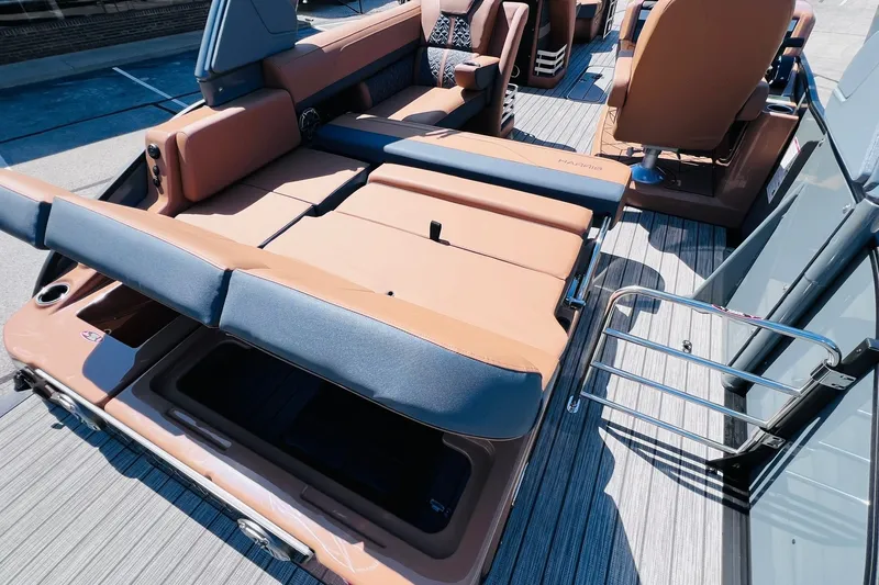 Slide: The Image of 2027 Harris Grand Mariner 250 SL boat interior with luxurious seating and modern design. - 30