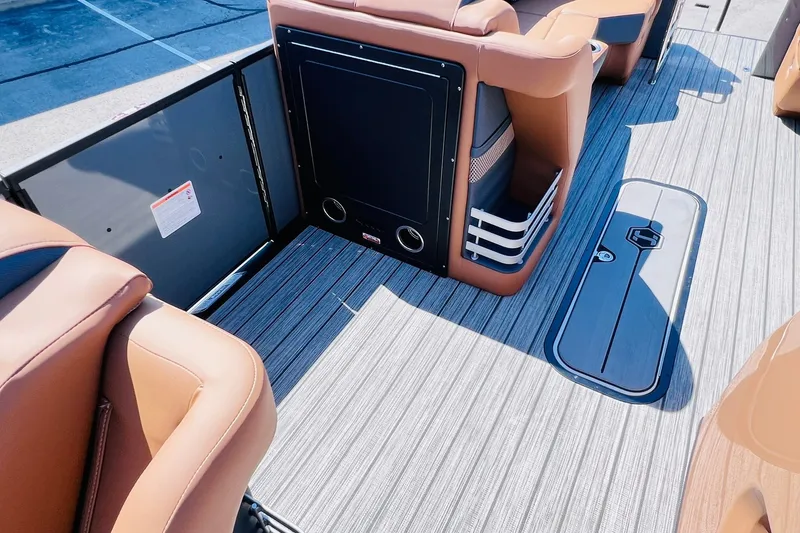 Slide: The Image of 2027 Harris Grand Mariner 250 SL boat interior with luxurious seating and sleek flooring. - 22