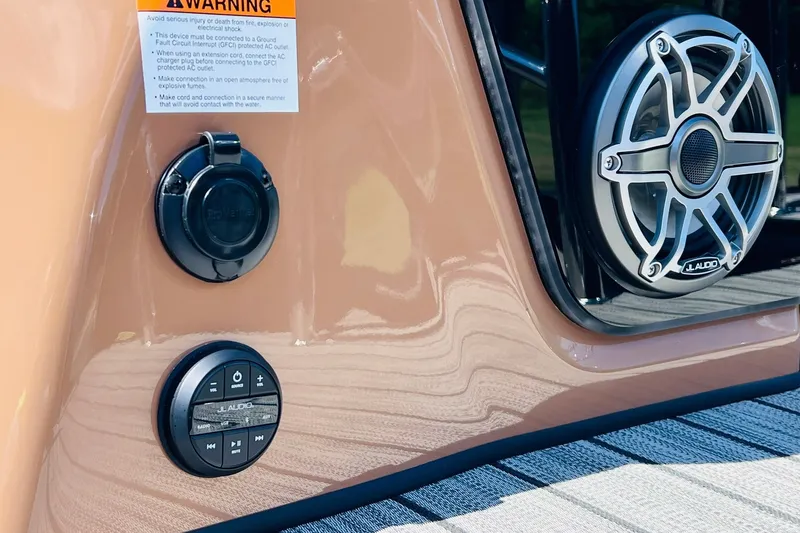 Slide: The Image of 2027 Harris Grand Mariner 250 SL with JL Audio speaker and control panel. - 46