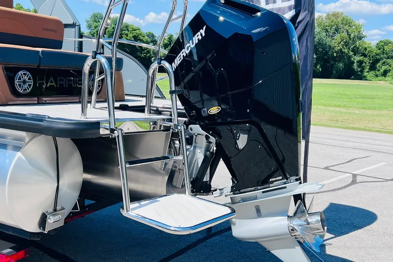 Slide: The Image of 2027 Harris Grand Mariner 250 SL boat with Mercury engine and swim ladder. - 38