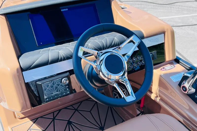 Slide: The Image of Steering console of 2027 Harris Grand Mariner 250 SL with modern controls and sleek design. - 12