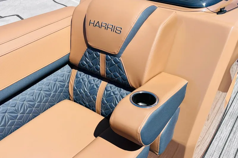 Slide: The Image of Luxurious seating on 2027 Harris Grand Mariner 250 SL boat with cup holder and elegant design. - 25
