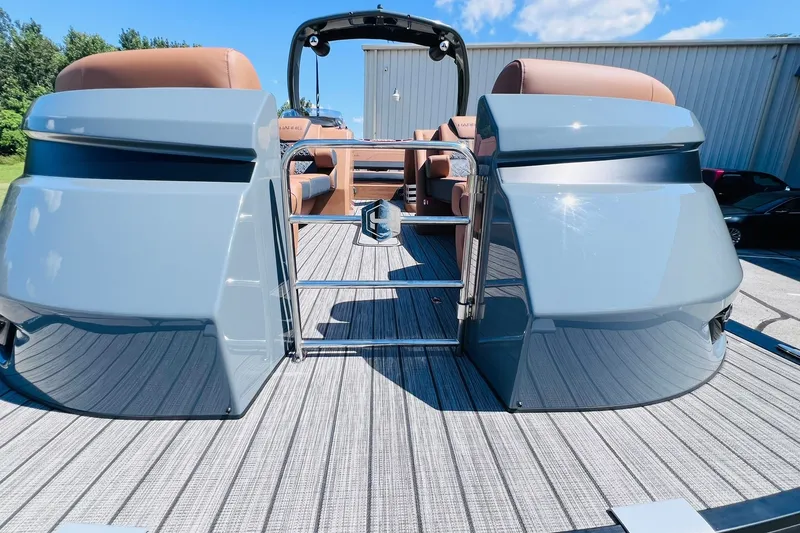 Slide: The Image of 2027 Harris Grand Mariner 250 SL pontoon boat with sleek design and luxurious seating. - 56