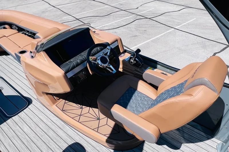 Slide: The Image of Luxurious helm of 2027 Harris Grand Mariner 250 SL with modern steering and seating. - 10