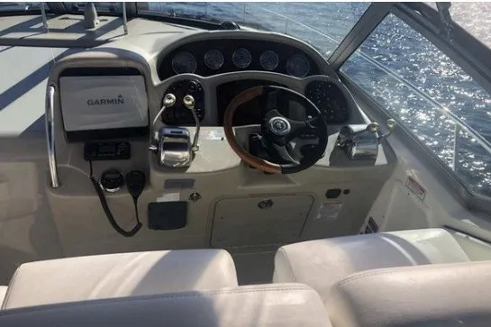 Slide: The Image of Cockpit of 2006 Sea Ray Sundancer 320 with Garmin navigation system and steering wheel. - 6