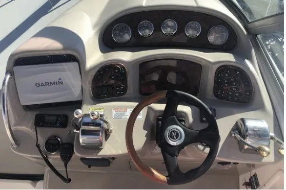 Slide: The Image of Cockpit of 2006 Sea Ray Sundancer 320 with Garmin navigation system and steering wheel. - 7