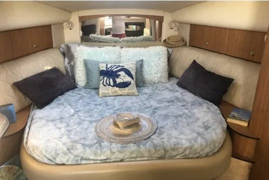 Slide: The Image of Luxurious 2006 Sea Ray Sundancer 320 cabin with cozy bedding and nautical decor. - 15