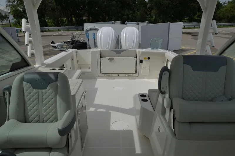 Slide: The Image of Interior view of 2027 Sailfish 316 DC boat, featuring luxurious seating and modern design. - 27