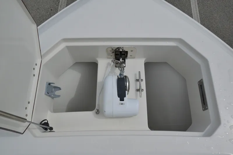 Slide: The Image of Anchor compartment of 2027 Sailfish 316 DC boat, featuring a modern winch system. - 22