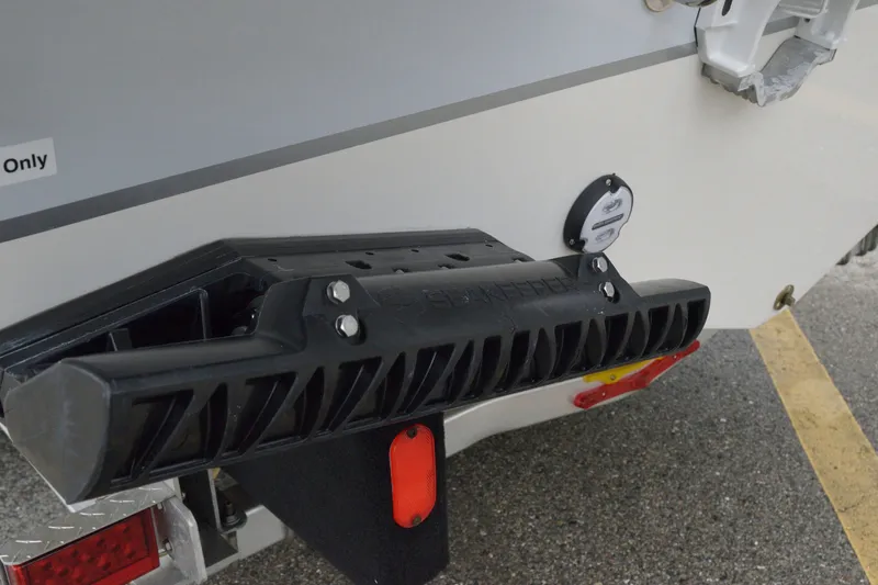 Slide: The Image of Rear view of 2027 Sailfish 316 DC boat with black bumper detail. - 28