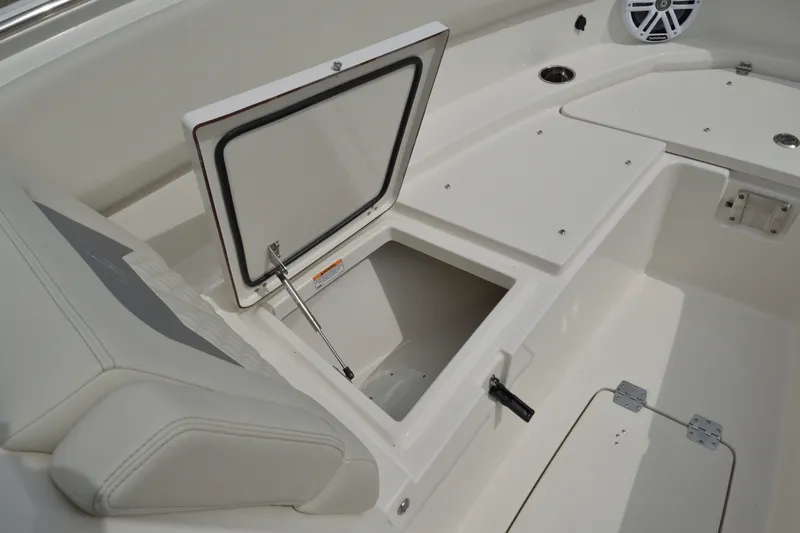 Slide: The Image of Open storage compartment on 2027 Sailfish 316 DC boat deck. - 25