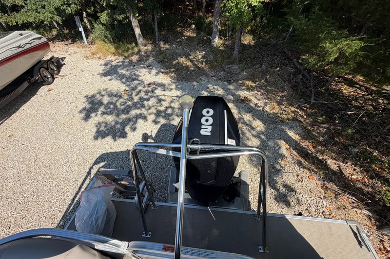 Slide: The Image of 2019 Princecraft Vectra 25 boat with 200 HP engine, parked on gravel near trees. - 34