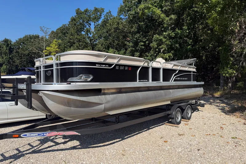 Slide: The Image of 2019 Princecraft Vectra 25 pontoon boat on trailer, parked outdoors near trees. - 12
