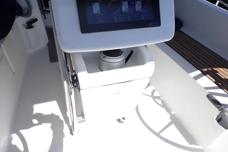 Slide: The Image of Cockpit of 2018 Jeanneau Sun Odyssey 389 sailboat with navigation equipment. - 84