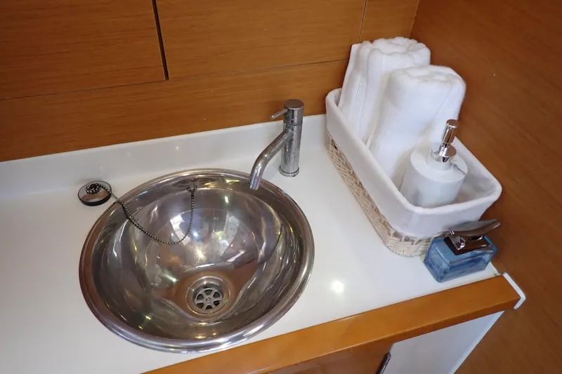 Slide: The Image of Stainless steel sink in 2018 Jeanneau Sun Odyssey 389 yacht bathroom. - 72
