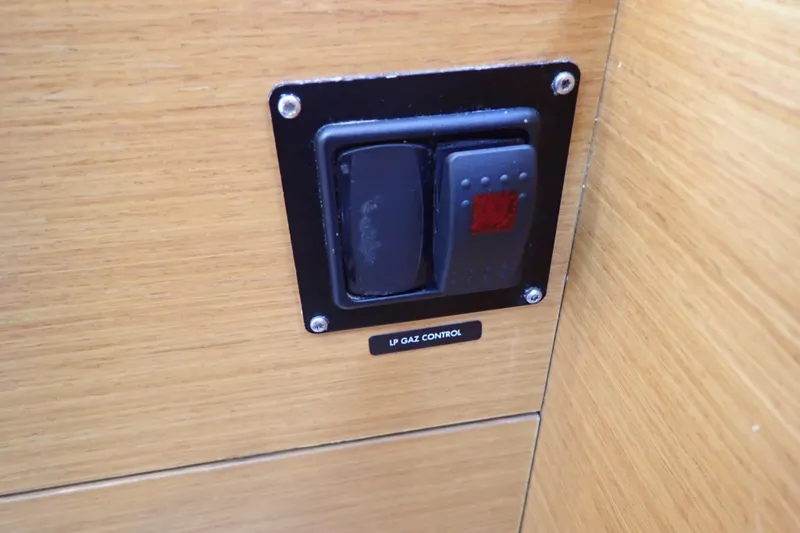 Slide: The Image of LP gas control switch on 2018 Jeanneau Sun Odyssey 389 yacht interior. - 111