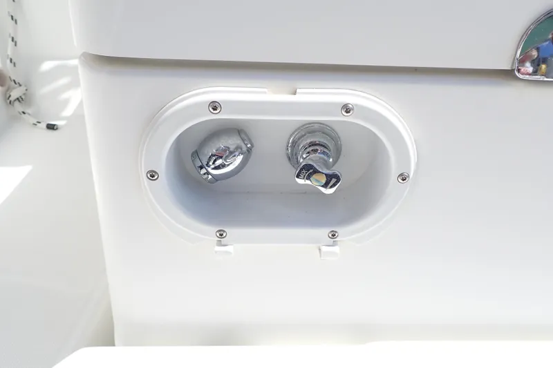 Slide: The Image of Close-up of Jeanneau Sun Odyssey 389 2018 boat's chrome water outlet. - 81