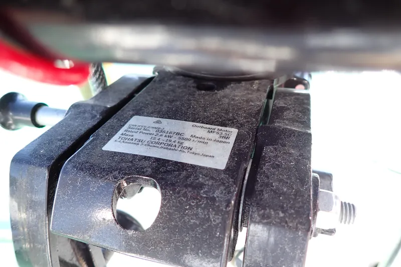 Slide: The Image of Close-up of a Tohatsu outboard motor label on a 2018 Jeanneau Sun Odyssey 389. - 185