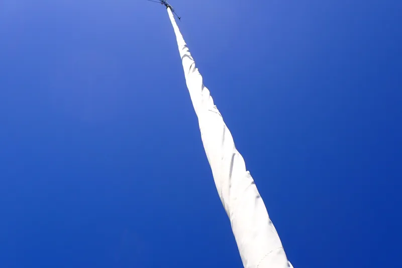 Slide: The Image of Close-up of Jeanneau Sun Odyssey 389 sail against clear blue sky, 2018 model. - 40