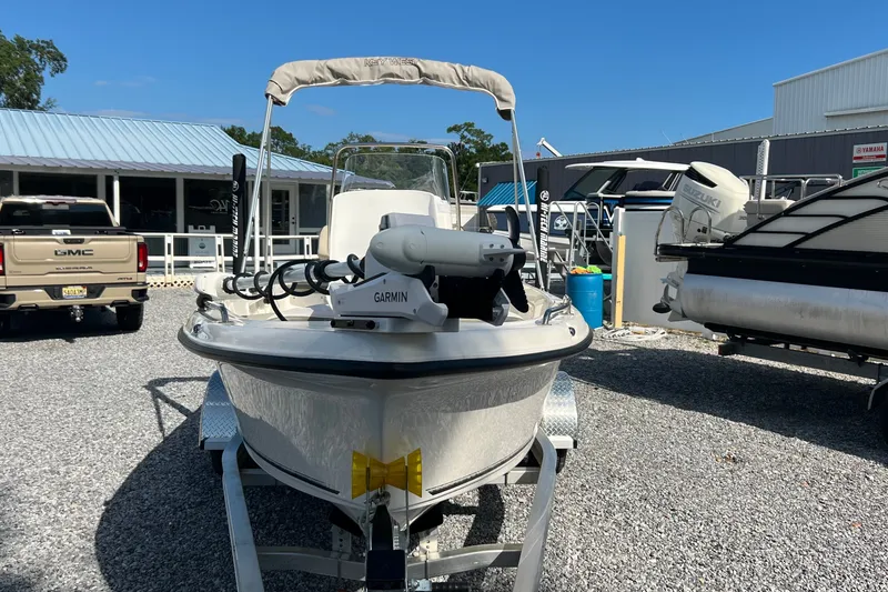 Slide: The Image of 2026 Key West 1720 Center Console boat on trailer, equipped with Garmin technology. - 7