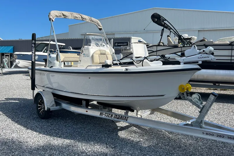 Slide: The Image of 2026 Key West 1720 Center Console boat on trailer, displayed outdoors. - 6