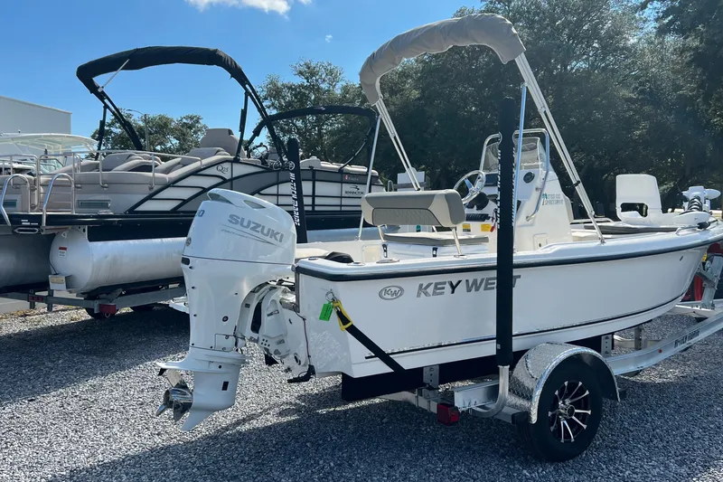Slide: The Image of 2026 Key West 1720 Center Console boat with Suzuki engine on trailer. - 4