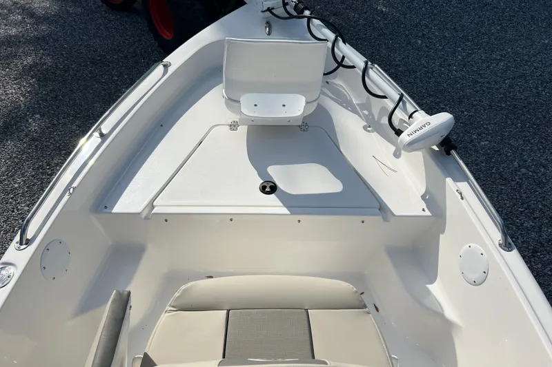 Slide: The Image of 2026 Key West 1720 Center Console boat interior with Garmin equipment, featuring sleek white design. - 8