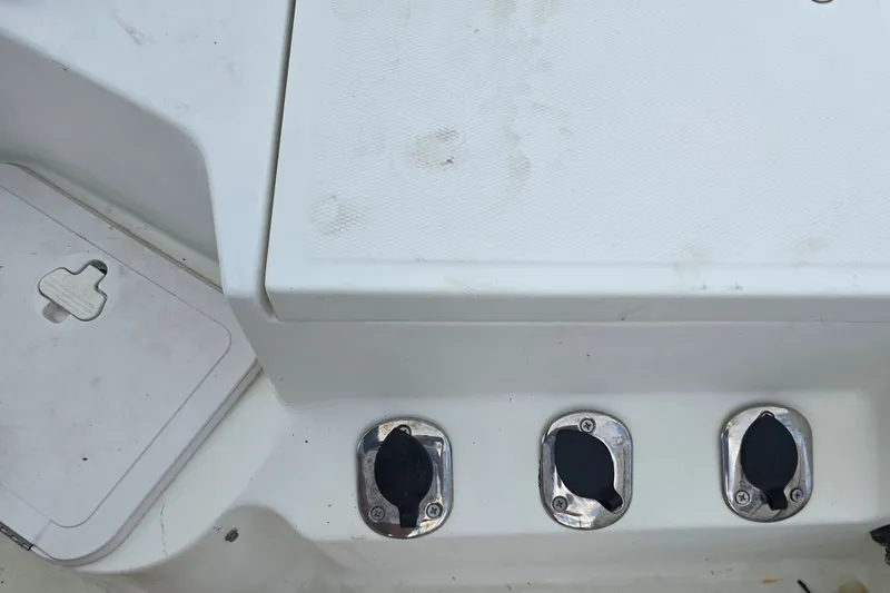 Slide: The Image of 2004 Sea Boss 180 Center Console boat deck with three fuel caps. - 17