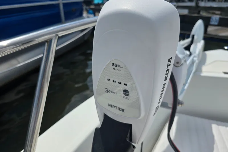 Slide: The Image of Minn Kota Riptide motor on 2004 Sea Boss 180 Center Console boat. - 6
