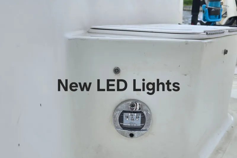 Slide: The Image of 2004 Sea Boss 180 Center Console with new LED lights installed. - 18