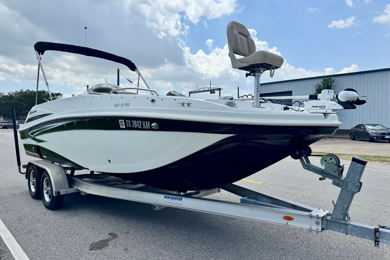 Slide: The Image of 2022 Hurricane Sundeck Sport 218 OB boat on trailer, parked outdoors. - 5
