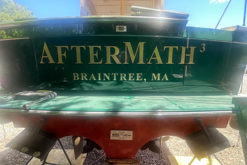 Slide: The Image of 2001 Sabre 36 Express boat named "AfterMath³" from Braintree, MA, docked outdoors. - 3