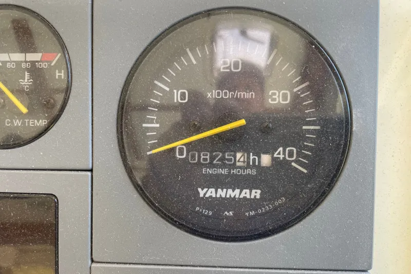 Slide: The Image of Yanmar engine hour meter showing 8254 hours on a 2001 Sabre 36 Express. - 10