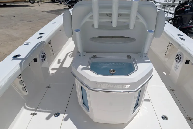 Slide: The Image of 2027 Pathfinder 2700 Tournament boat interior with rod holders and storage compartments. - 14
