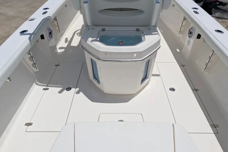 Slide: The Image of 2027 Pathfinder 2700 Tournament boat interior with storage compartments and seating. - 7