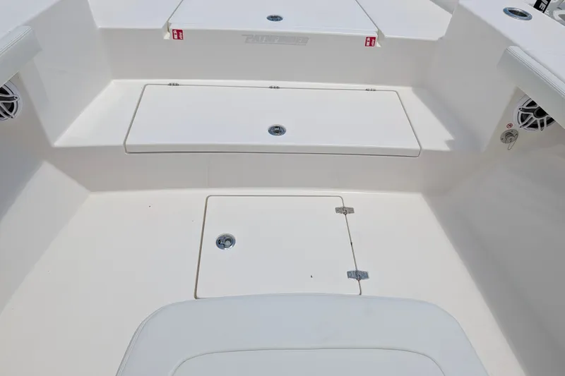 Slide: The Image of 2027 Pathfinder 2700 Tournament boat interior with storage compartments and speakers. - 33