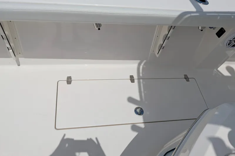 Slide: The Image of Pathfinder 2700 Tournament 2027 boat deck with storage compartment and fixtures. - 18