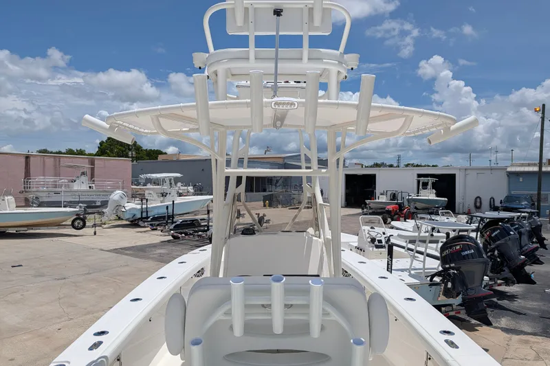 Slide: The Image of 2027 Pathfinder 2700 Tournament boat in a marina with clear skies. - 9
