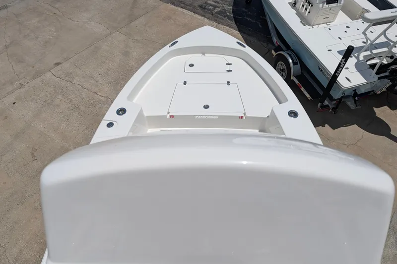 Slide: The Image of Bow view of a 2027 Pathfinder 2700 Tournament boat on a concrete surface. - 50