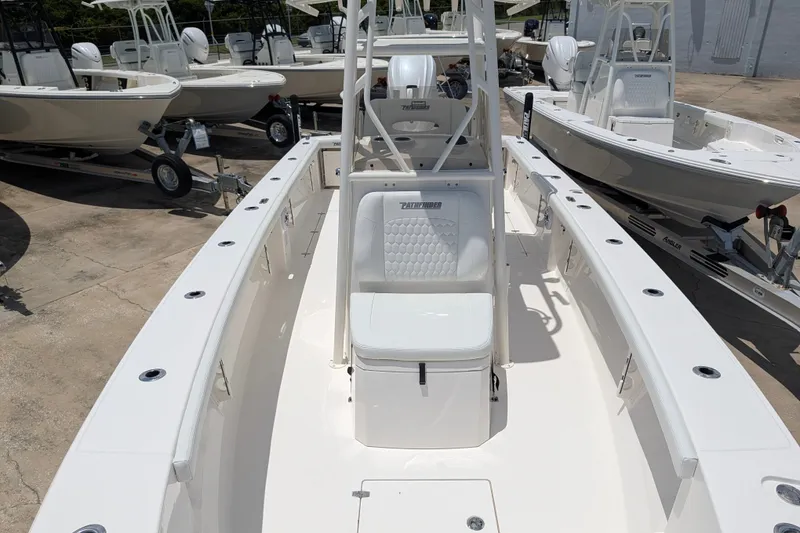 Slide: The Image of 2027 Pathfinder 2700 Tournament boat with sleek white design and spacious seating. - 40