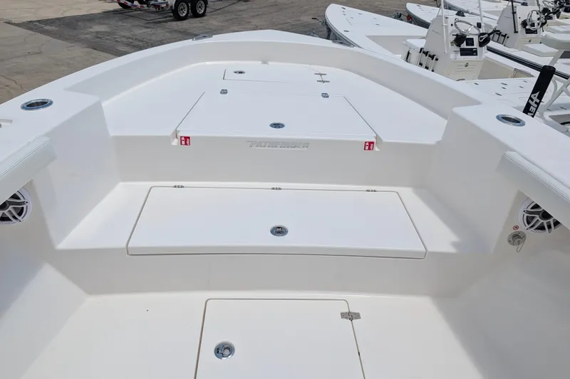 Slide: The Image of 2027 Pathfinder 2700 Tournament boat deck with storage compartments and speakers. - 34