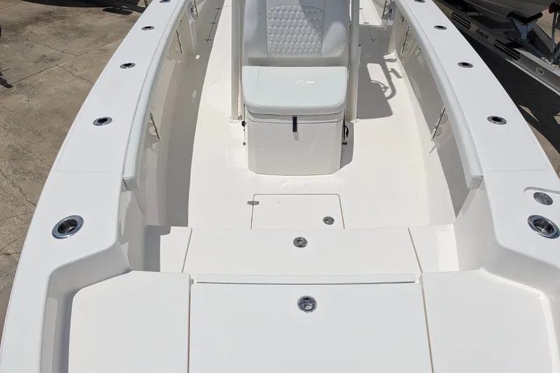 Slide: The Image of 2027 Pathfinder 2700 Tournament boat interior with seating and storage compartments. - 39