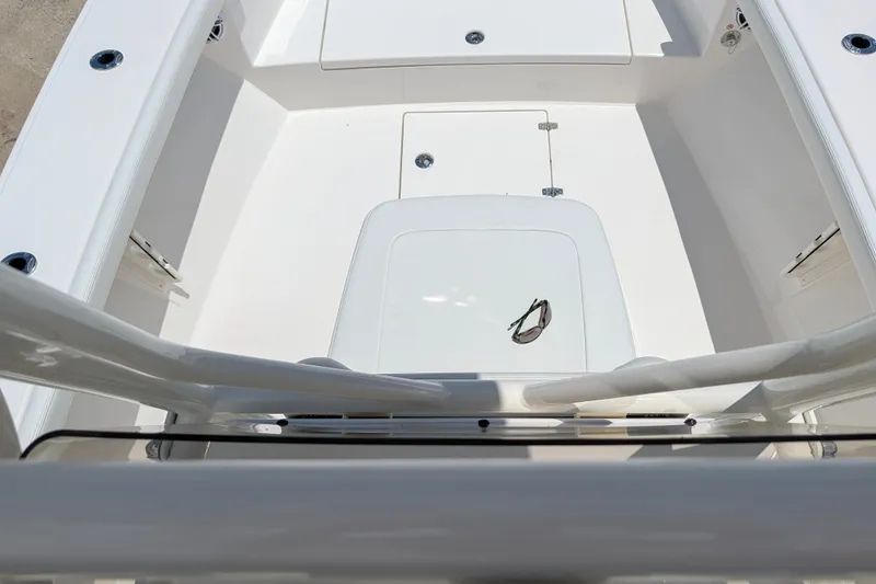 Slide: The Image of Interior view of a 2027 Pathfinder 2700 Tournament boat, featuring sleek white design. - 57