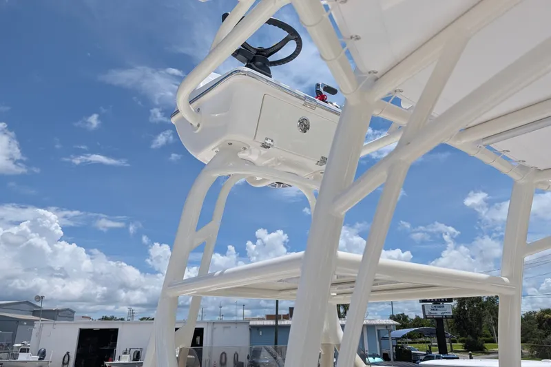 Slide: The Image of 2027 Pathfinder 2700 Tournament boat tower against a bright blue sky. - 28