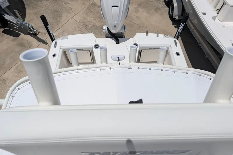 Slide: The Image of 2027 Pathfinder 2700 Tournament boat deck with rod holders and motor, viewed from above. - 51