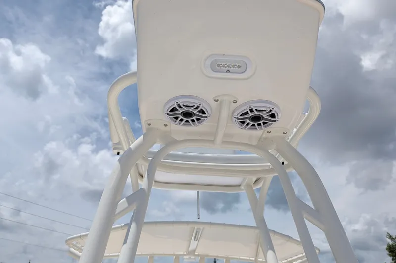 Slide: The Image of T-top speakers on 2027 Pathfinder 2700 Tournament boat under cloudy sky. - 43