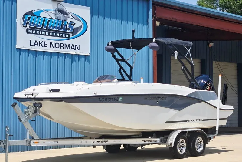 Slide: The Image of 2024 Starcraft SVX 231 OB boat on trailer at Foothills Marine Center, Lake Norman. - 13
