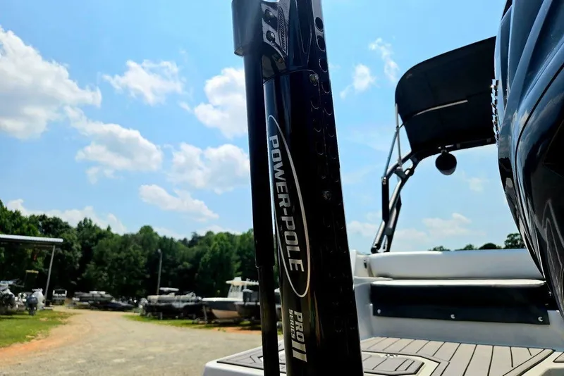 Slide: The Image of 2024 Starcraft SVX 231 OB boat with Power-Pole Pro II, sunny day, outdoor setting. - 50
